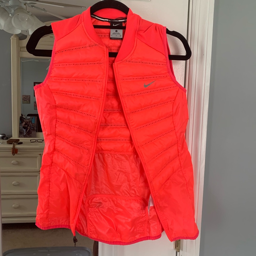 Nike bright pink reflector running vest